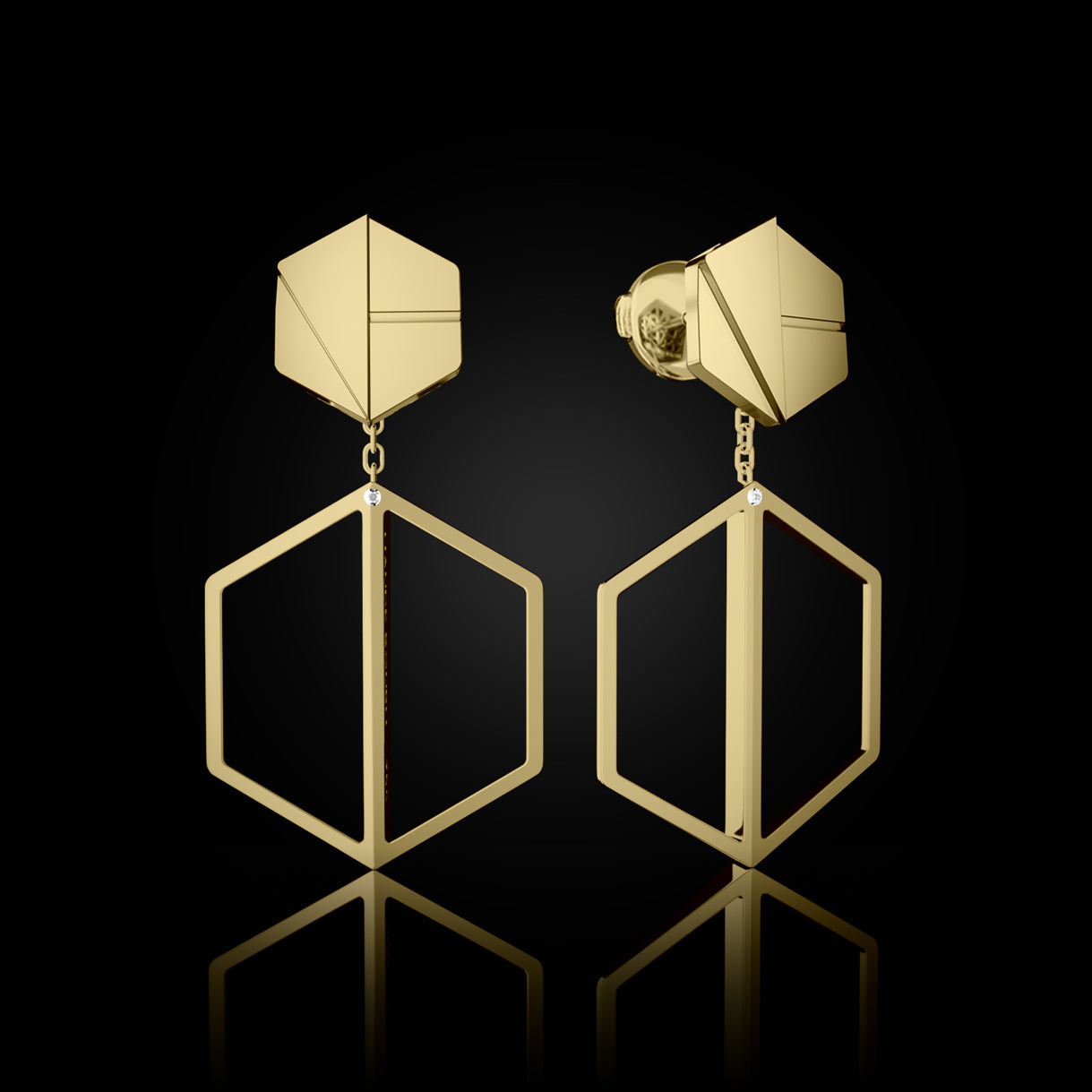 Hear You Studs with Short Illuminate You Danglers in Bravura Yellow Gold – dynamic earring set designed for confident, intentional wear by Naude Bourn. Sustainable gold jewelry, ethical jewelry, handcrafted artisan jewelry, fine jewelry, high-end jewelry, and ethical luxury. A bold and intentional design from sustainable jewelry brands and a unique jewelry gift in yellow gold.